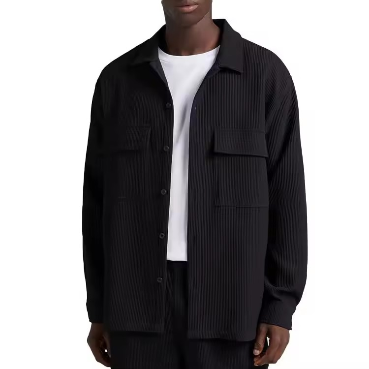 Relaxed fit shirt in black pleated oversized shirt with two flap pockets plastic button placket